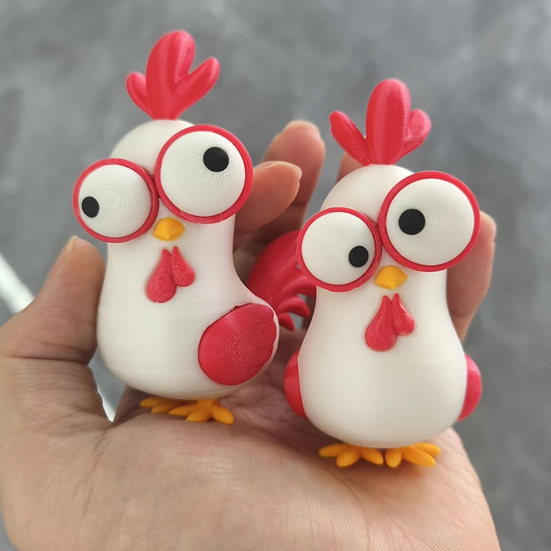 White and red chicken desk ornament with round red glasses, beak, and yellow feet