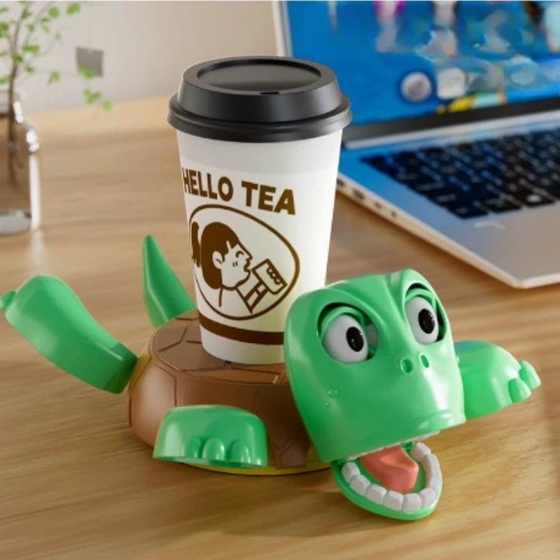 Green turtle fidget coaster with googly eyes and hinged shell lid