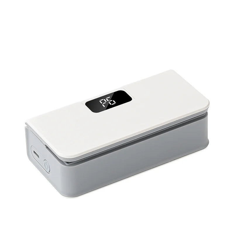 Rechargeable handheld heat sealer, white body with black display window