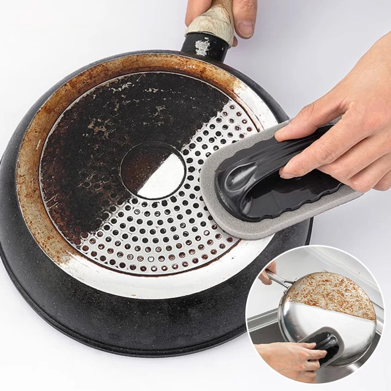 Rust eraser sponge brush with black handle and gray abrasive sponge pad