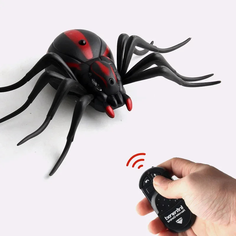 Black and red remote control spider-cockroach toy with handheld infrared controller