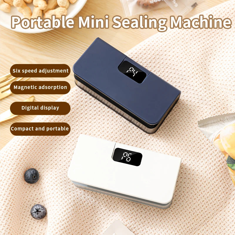 Handheld mini bag sealer with dark display window, blue-gray body and sealing edge
