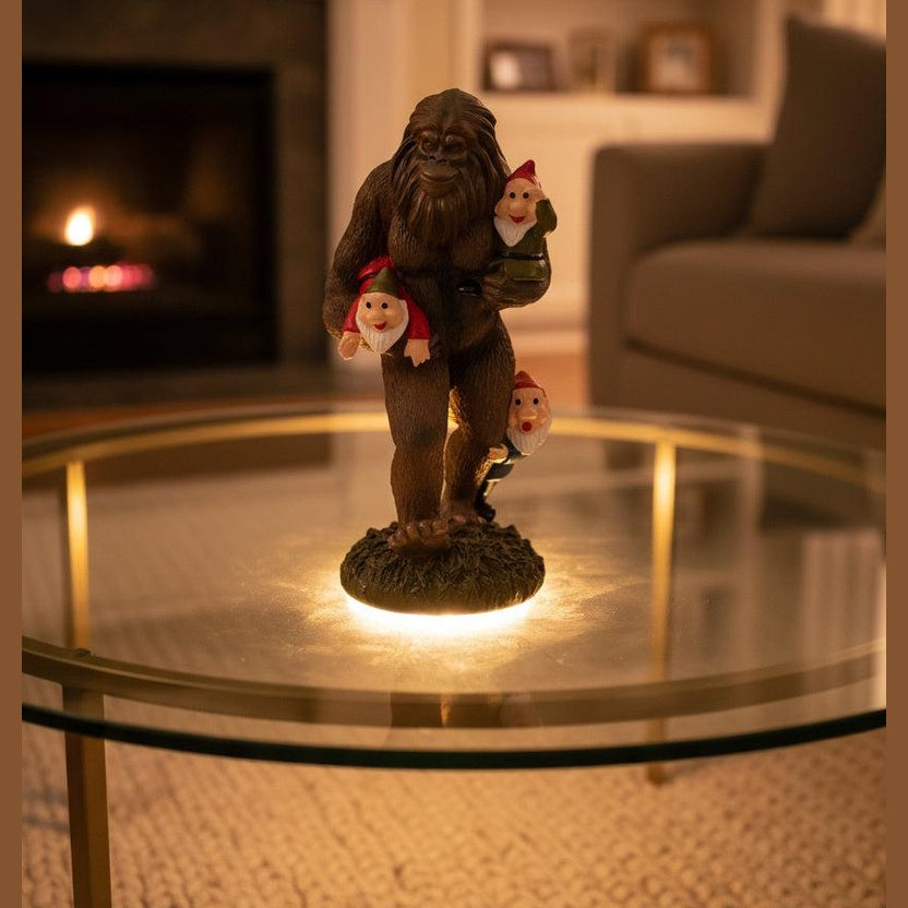 Funny Bigfoot Carrying Gnome Decorative Figurine | Playful Resin Accent